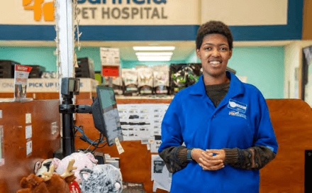 Faith working her job at a PetSmart in Chicago